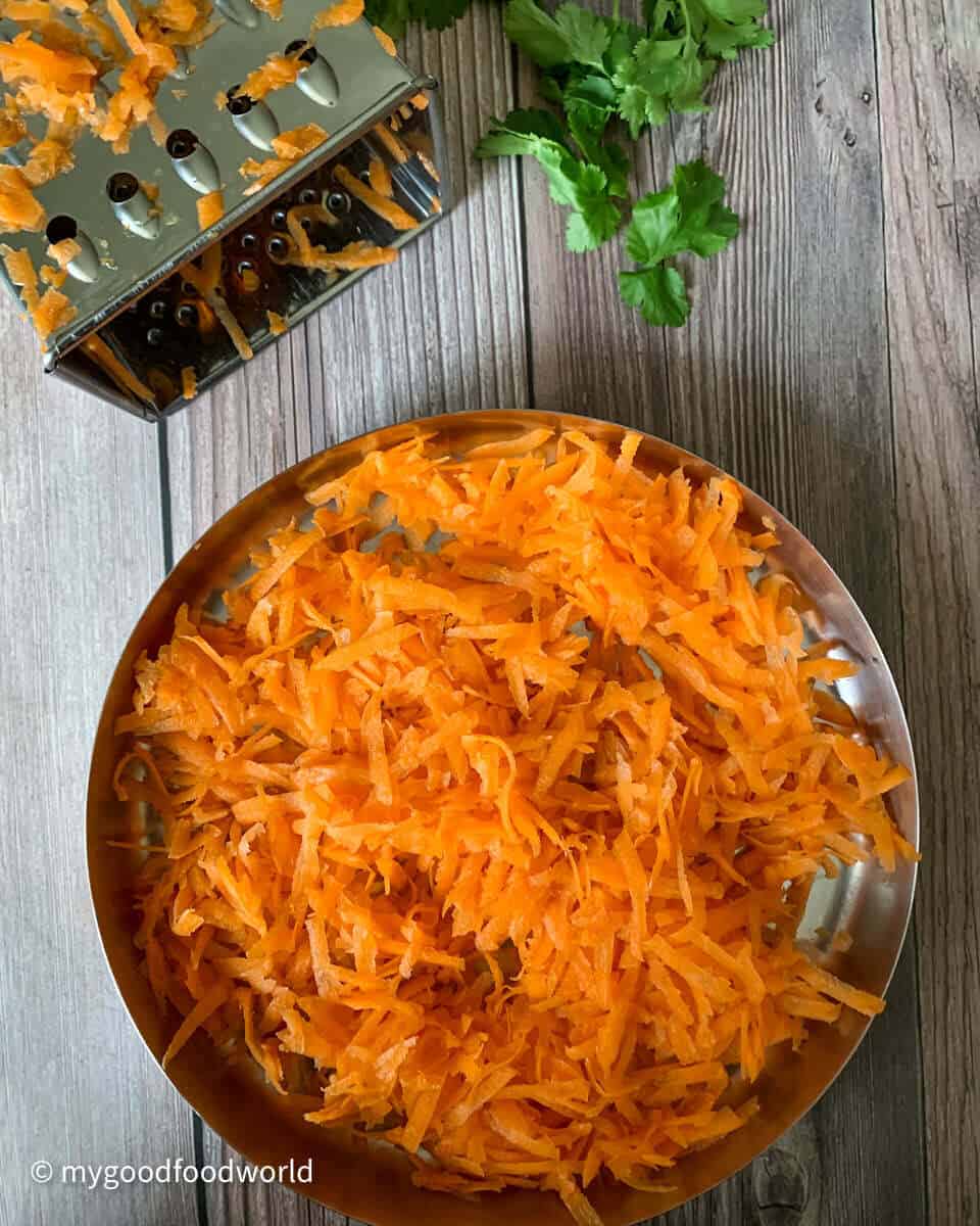grated carrot in a steel plate.