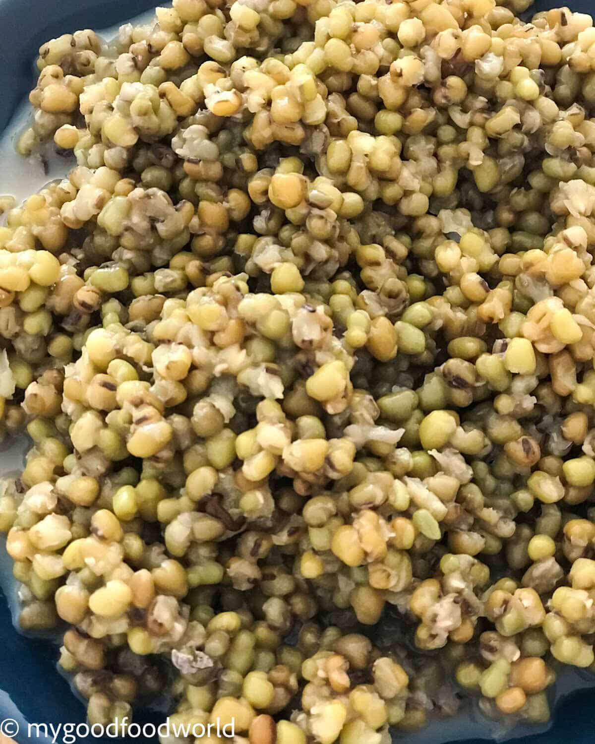 Cooked green moong dal placed in a bowl.