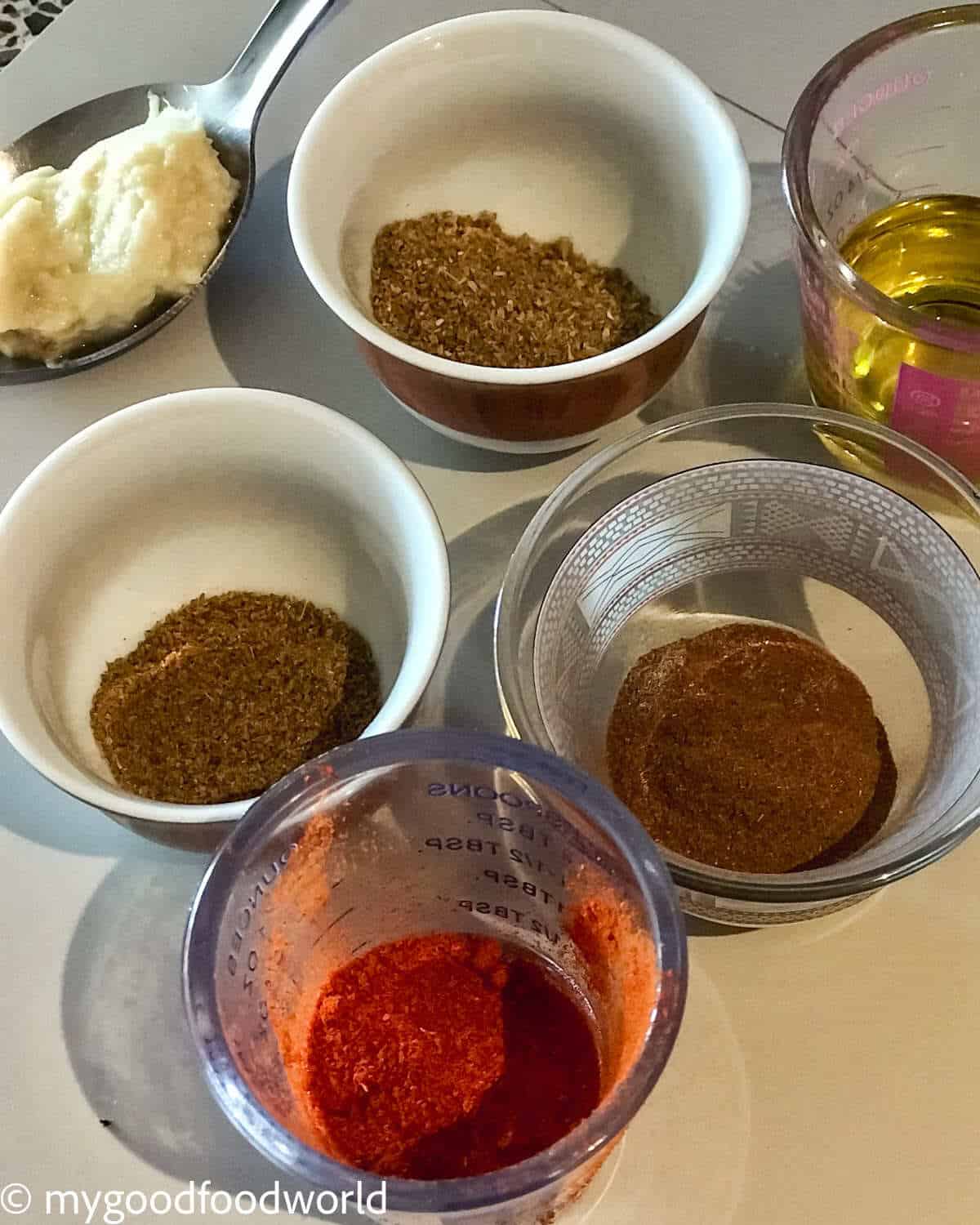 Spices for couscous served in small bowls.
