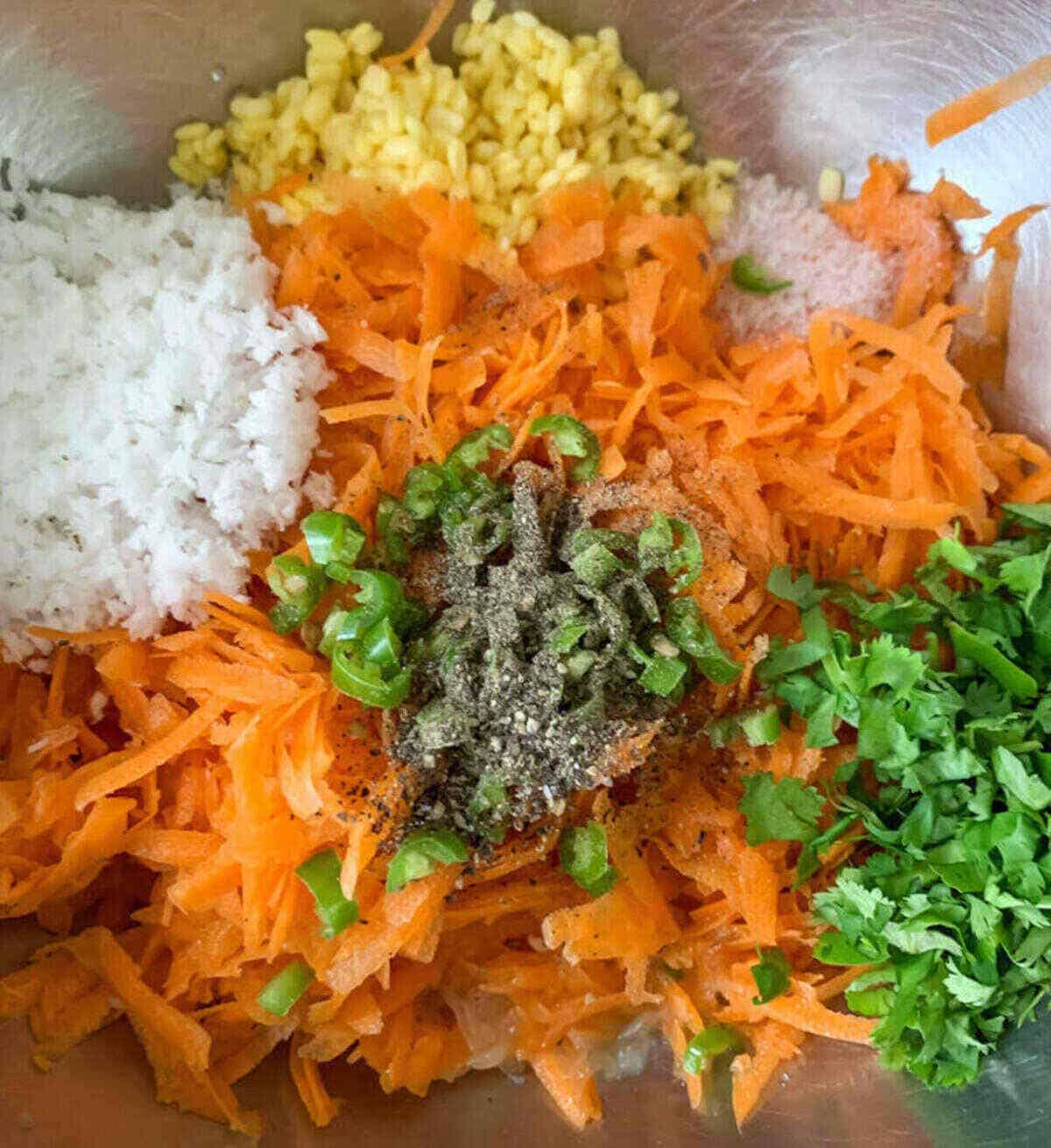 Mixing grated carrot and lentils with spices.