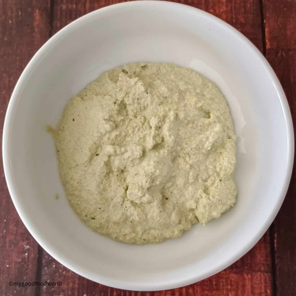 Posto bata, a smooth paste of white poppy seeds and green chili peppers.