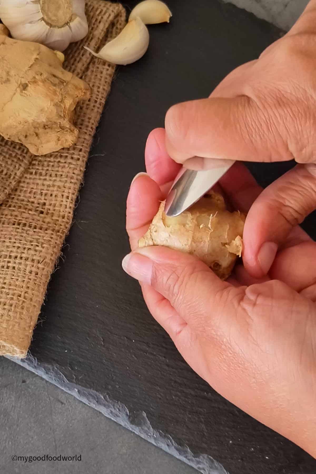 Step-by-step process of peeling ginger for homemade paste.