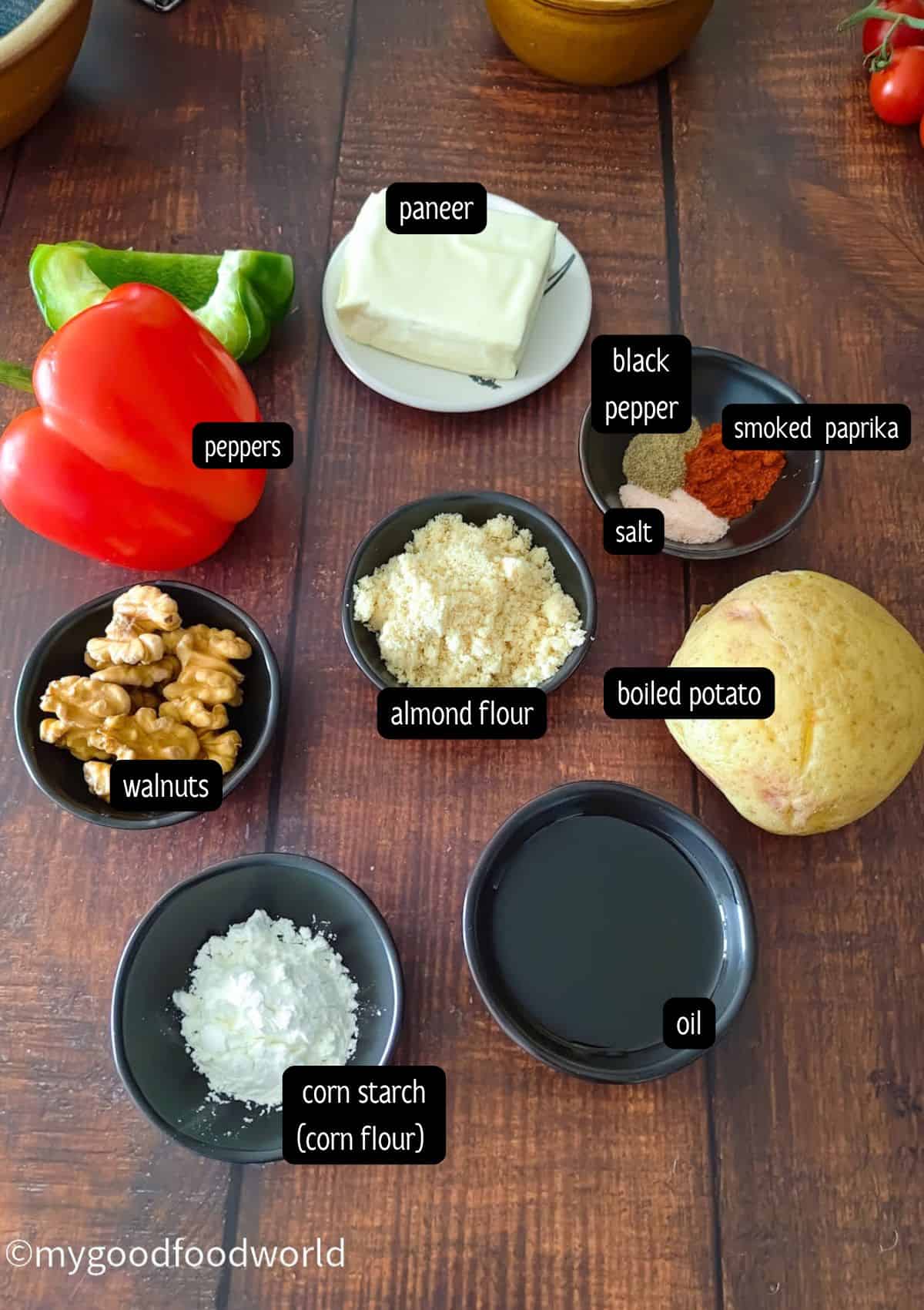 Ingredients for walnut paneer cutlet: paneer, bell peppers, walnuts, almond flour, potato, and spices.